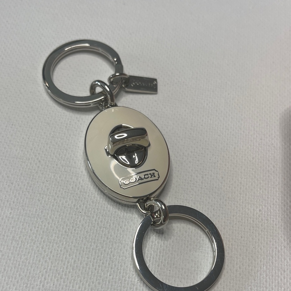 Coach Silver and White Valet Keychain